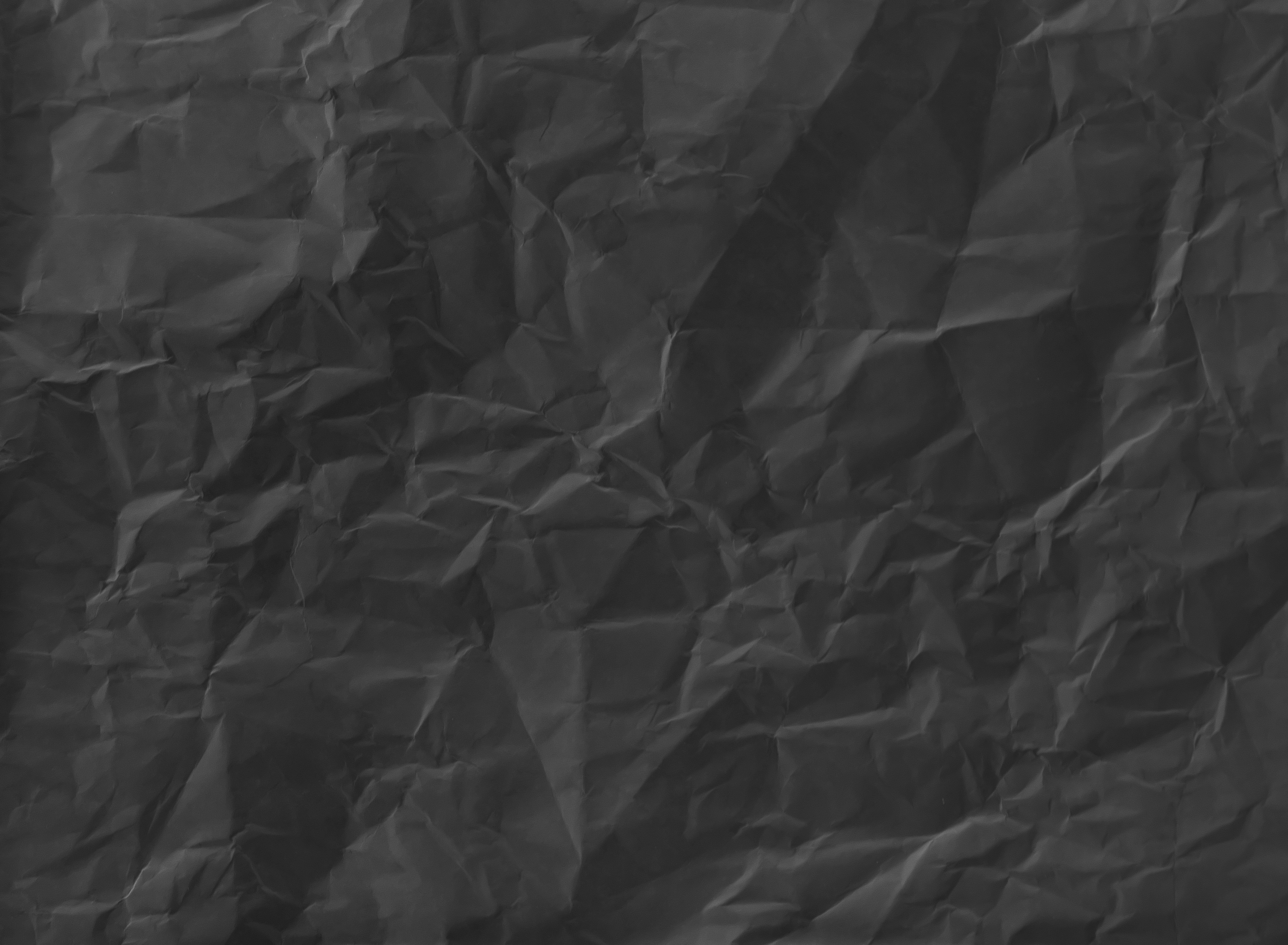 Dark Crumpled Paper Texture Background